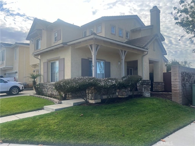 view of front of property featuring a front yard