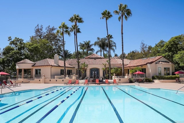 community pool with a patio