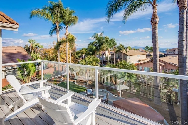 wooden deck with a residential view