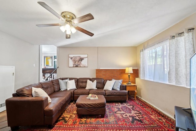 living room featuring ceiling fan