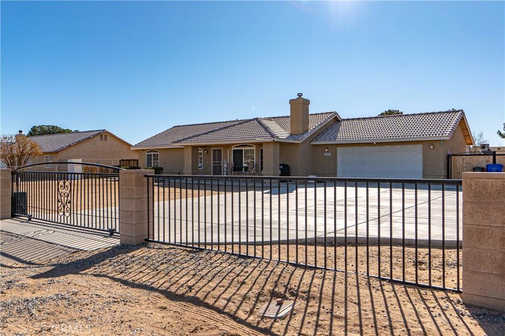 ranch-style house featuring a garage