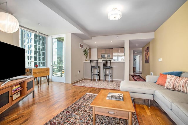 living room with light wood-type flooring