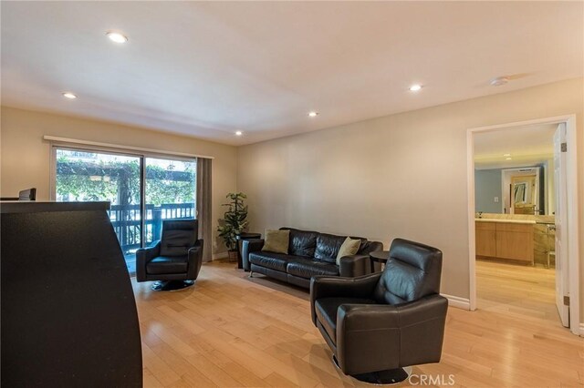 22100 Burbank Blvd Unit 138D, Woodland Hills, CA 91367 - living area featuring light wood finished floors, recessed lighting, and baseboards