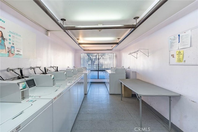 laundry room featuring independent washer and dryer