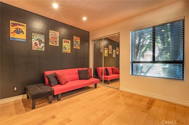 sitting room featuring light wood-type flooring