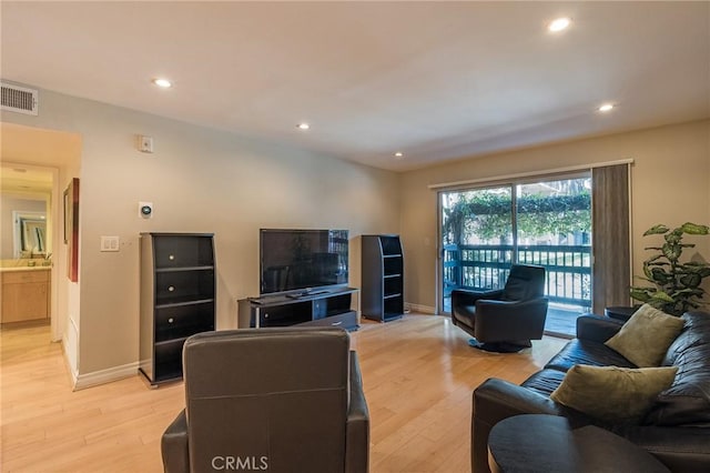 22100 Burbank Blvd Unit 138D, Woodland Hills, CA 91367 - living area featuring light wood-style flooring, recessed lighting, and baseboards
