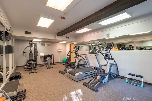 22100 Burbank Blvd Unit 138D, Woodland Hills, CA 91367 - workout area featuring beamed ceiling and baseboards