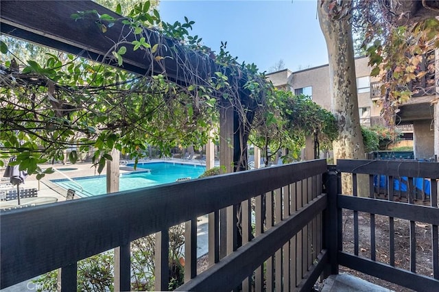 22100 Burbank Blvd Unit 138D, Woodland Hills, CA 91367 - balcony with view of pool area