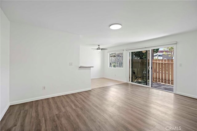 interior space featuring light wood-type flooring and ceiling fan