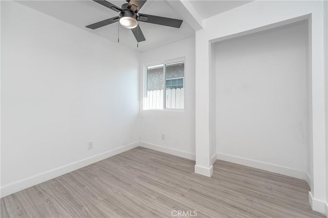 unfurnished room with light hardwood / wood-style floors and ceiling fan