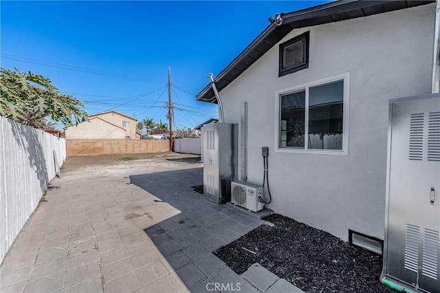 view of patio / terrace featuring ac unit