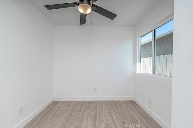 spare room with ceiling fan and light hardwood / wood-style flooring