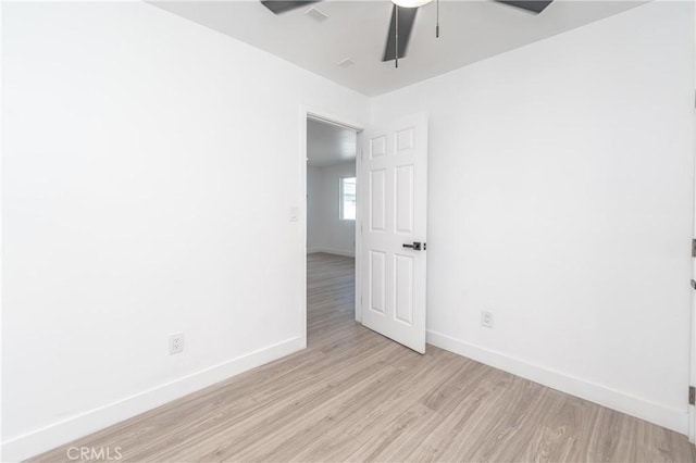 unfurnished room featuring ceiling fan and light hardwood / wood-style flooring