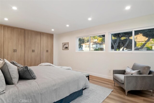 bedroom featuring light hardwood / wood-style flooring