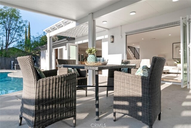 view of patio / terrace featuring a fenced in pool