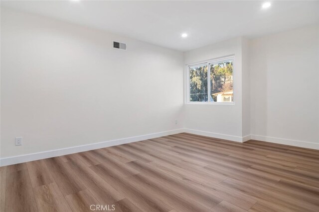 empty room featuring light hardwood / wood-style floors