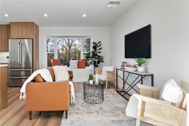 living room featuring light hardwood / wood-style floors