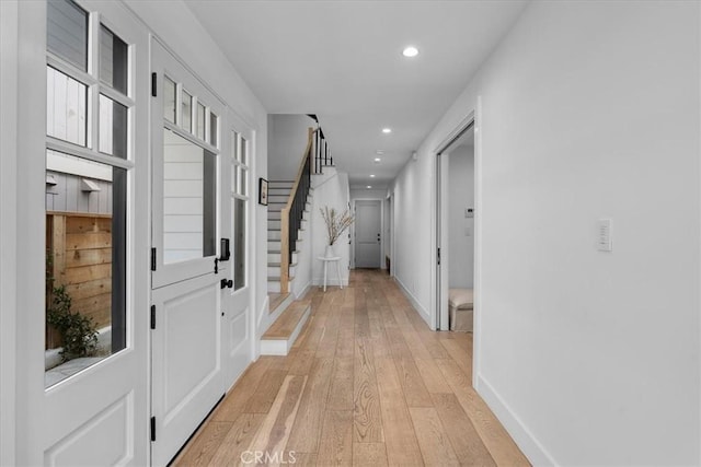 corridor featuring light hardwood / wood-style flooring