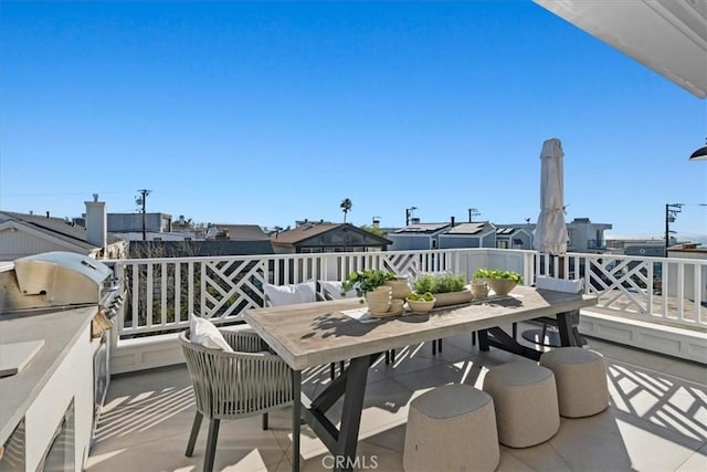 view of patio / terrace with an outdoor kitchen and a grill