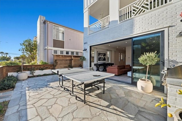 view of patio / terrace featuring a balcony