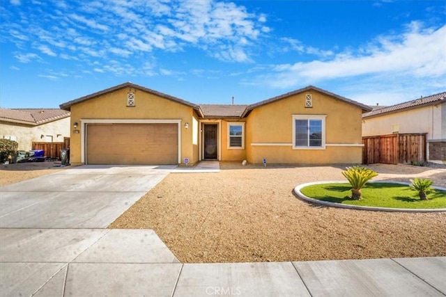 ranch-style home featuring a garage