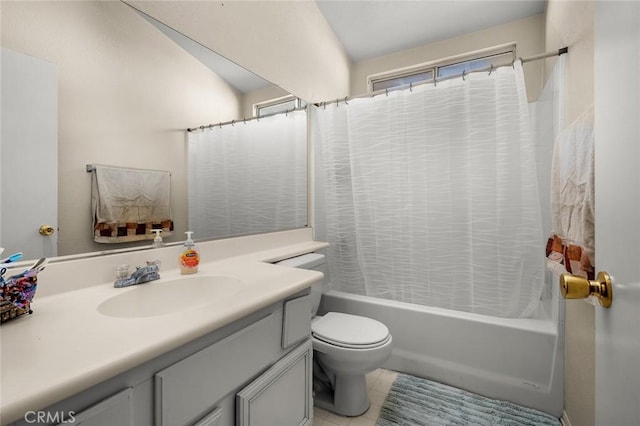 full bathroom featuring toilet, vanity, and shower / tub combo