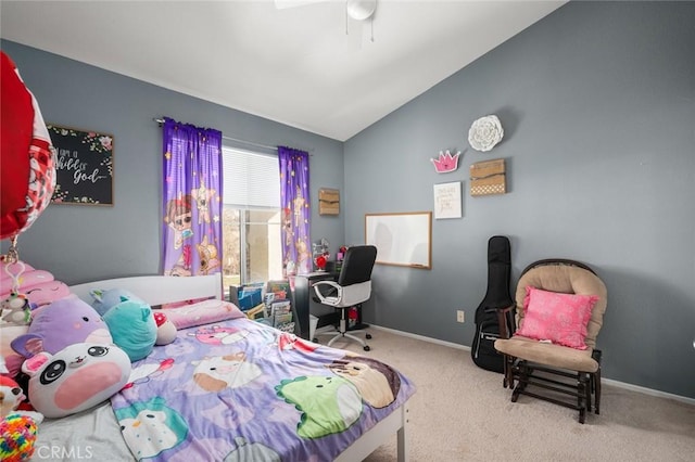 carpeted bedroom with ceiling fan and vaulted ceiling