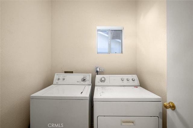 laundry area with washer and clothes dryer