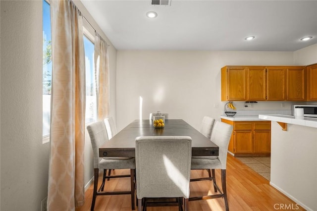 dining area featuring light hardwood / wood-style floors