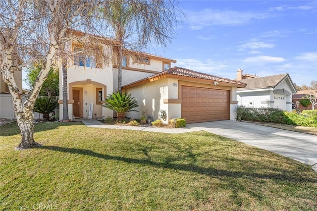 mediterranean / spanish-style house featuring a front lawn and a garage