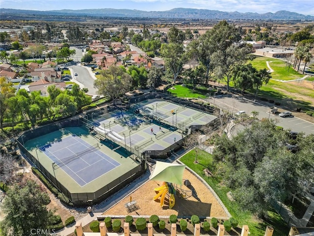 birds eye view of property featuring a mountain view