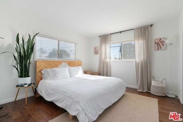 bedroom with wood-type flooring