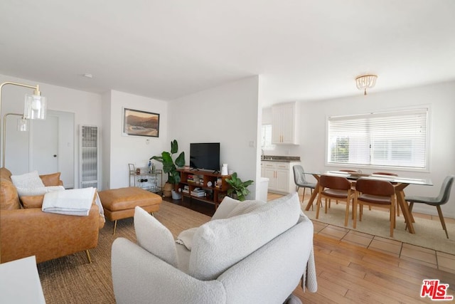 living room with light hardwood / wood-style floors