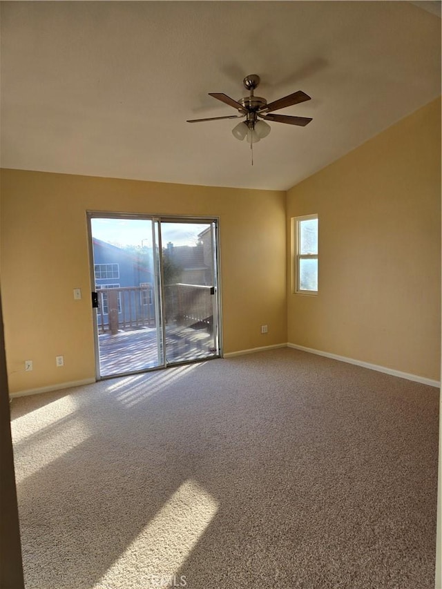 carpeted empty room with ceiling fan