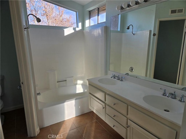 bathroom featuring vanity and tile patterned flooring