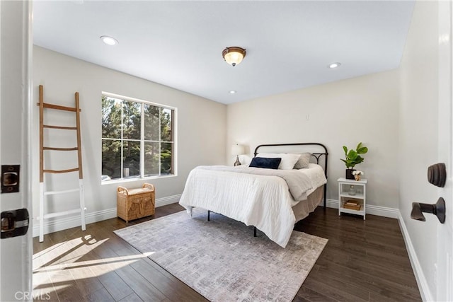 bedroom featuring dark hardwood / wood-style floors