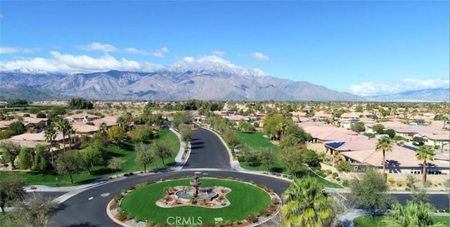 drone / aerial view featuring a mountain view