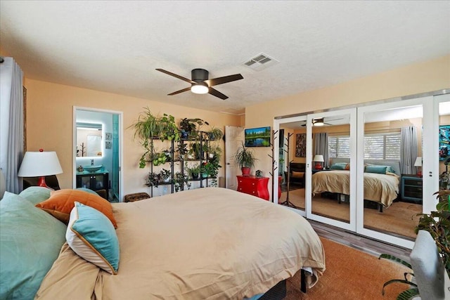 bedroom featuring ceiling fan and wood-type flooring