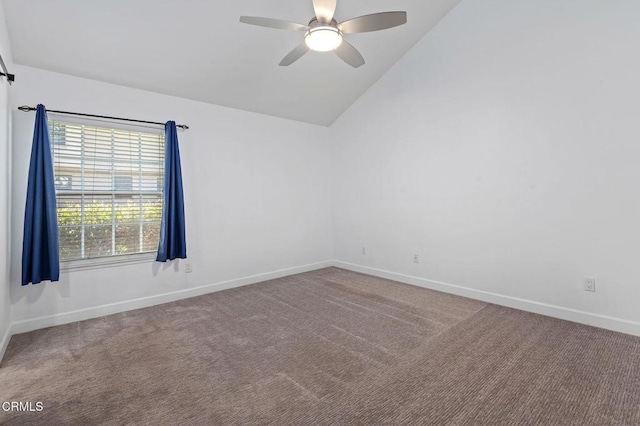 carpeted empty room featuring ceiling fan and high vaulted ceiling