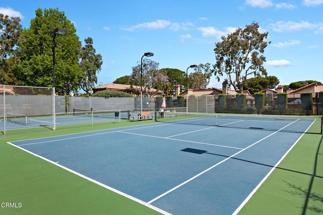 view of sport court featuring basketball court