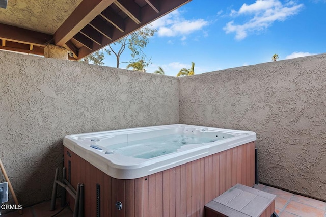 view of patio featuring a hot tub