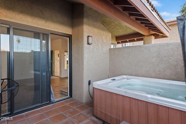 view of patio featuring a hot tub