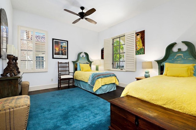 bedroom featuring ceiling fan and hardwood / wood-style flooring