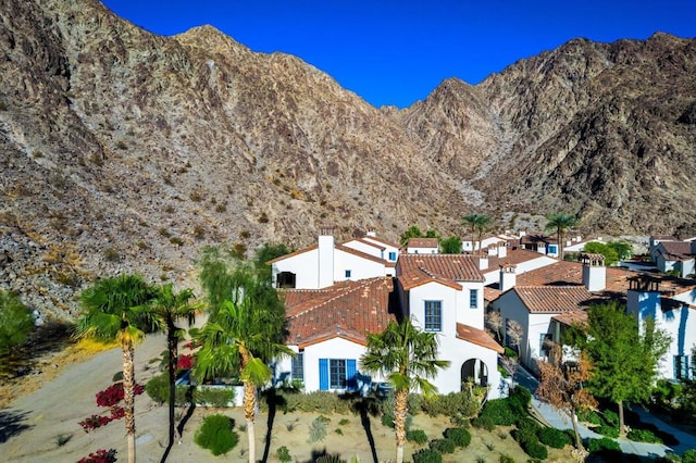 drone / aerial view featuring a mountain view