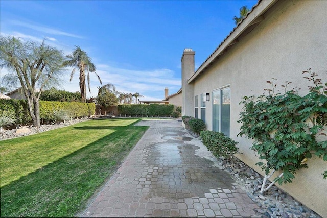 view of yard featuring a patio