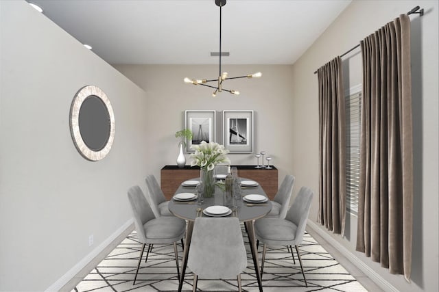 dining room featuring an inviting chandelier