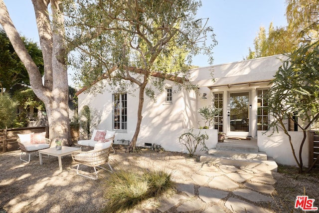 rear view of house featuring a patio area