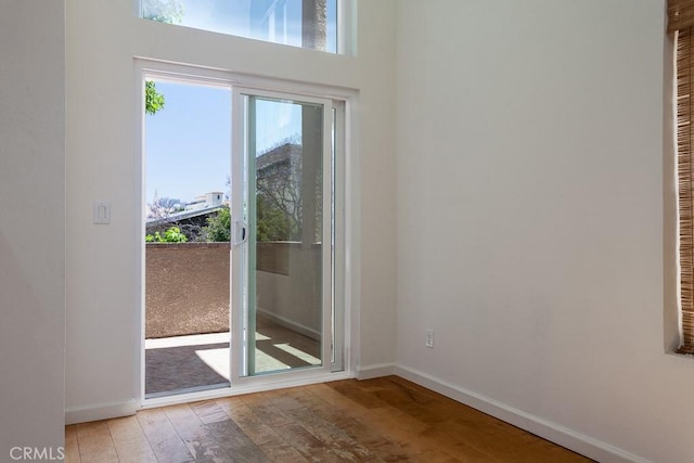 1639 Camden Ave Unit 301, Los Angeles, CA 90025 - entryway featuring hardwood / wood-style floors and baseboards