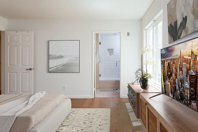 1639 Camden Ave Unit 301, Los Angeles, CA 90025 - bedroom with baseboards and connected bathroom