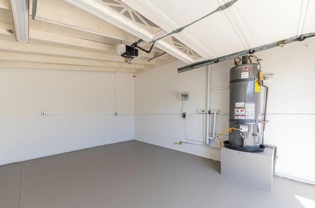 garage featuring secured water heater and a garage door opener